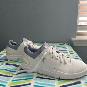 On Running White and Gray Sneakers